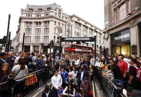 Commuters try to enter Oxford Circus Underground station shortly before the start of a 24 hour strike in London, Britain August 5, 2015. REUTERS/Darren Staples