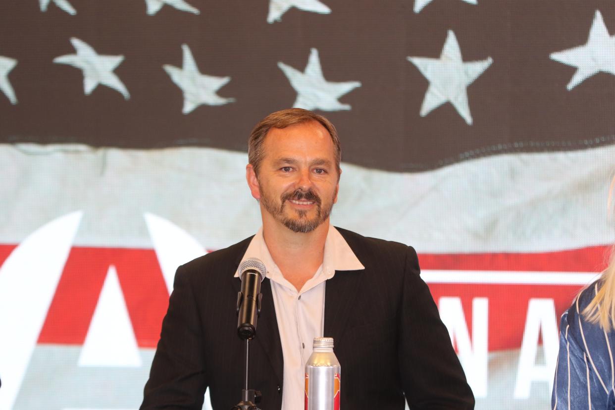 Ward 3 Carlsbad City Council candidate Aaron Jones pauses during a candidate forum on Oct. 30, 2023.