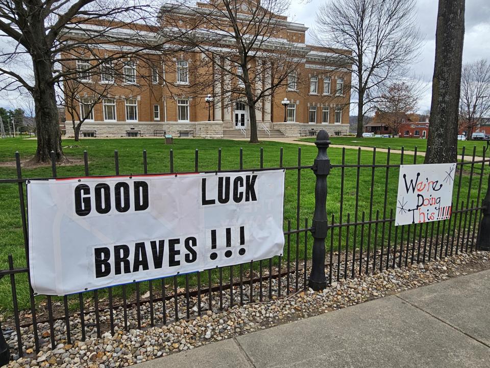 Signs outside the Jackson County Courthouse in Brownstown wishing the Braves good luck.