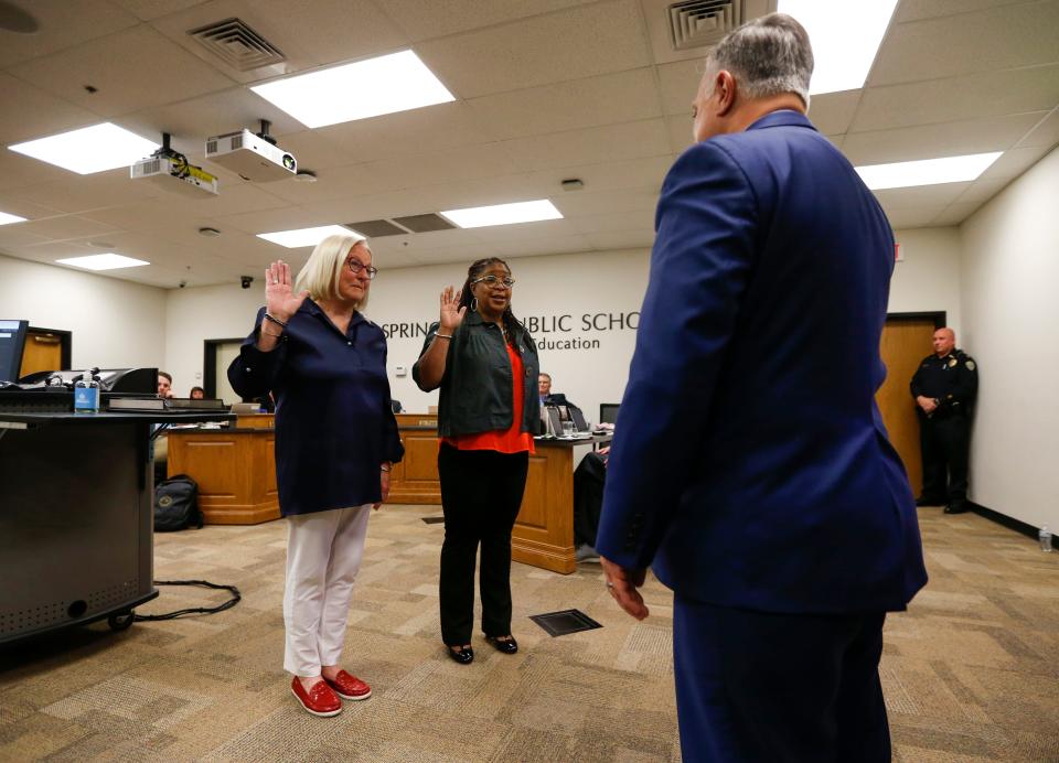 Judy Brunner and Shurita Thomas-Tate are sworn in as Springfield school board members at the April 11 meeting.