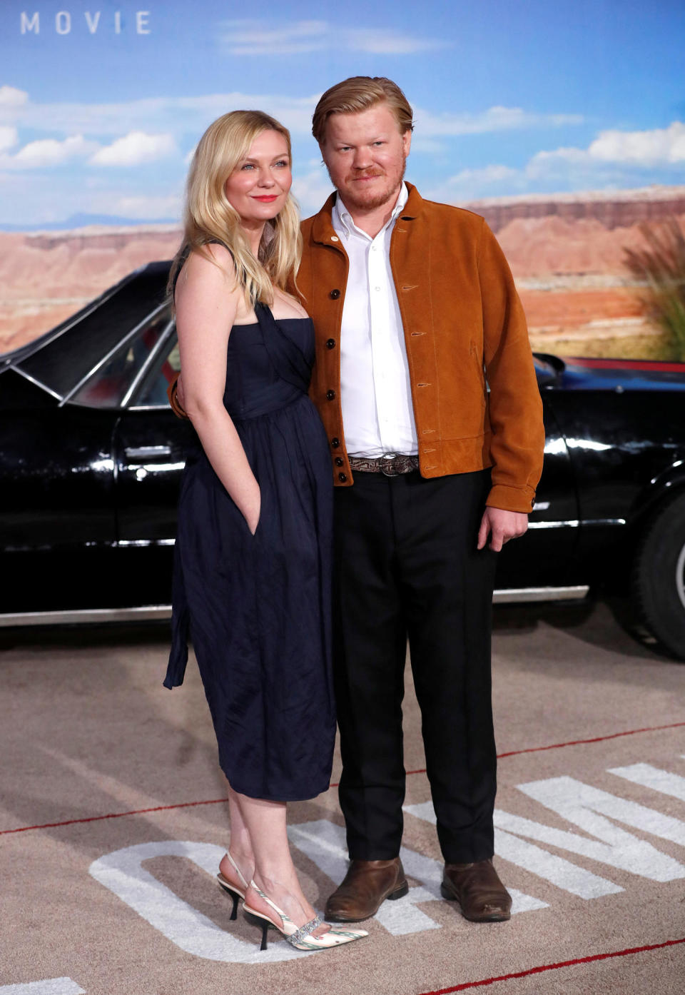 Actors Jesse Plemons and Kirsten Dunst pose at the premiere for 