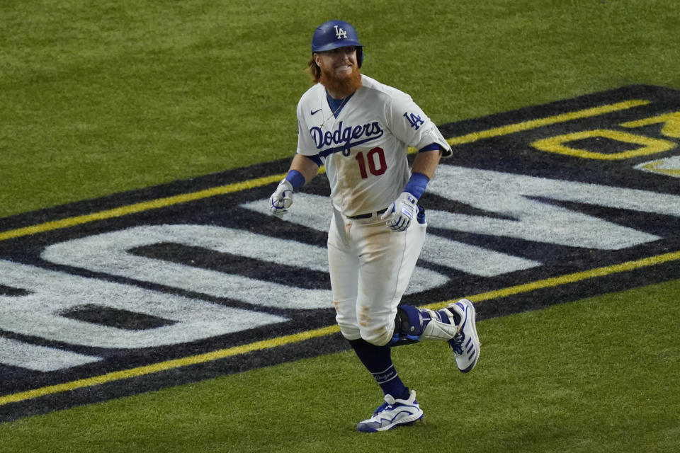 Los Angeles Dodgers' Justin Turner flies out against the Tampa Bay Rays during the sixth inning against the Tampa Bay Rays a baseball World Series Game 6 Tuesday, Oct. 27, 2020, in Arlington, Texas. (AP Photo/Sue Ogrocki)