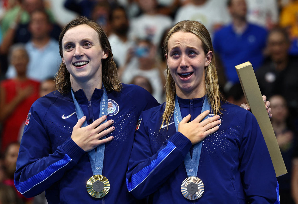 U.S. gold medalist Katie Ledecky celebrates with U.S. bronze medalist Paige Madden during the women's 800m freestyle victory ceremony on Saturday.