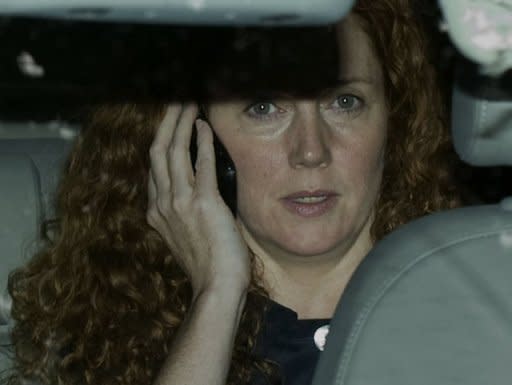 Former News International Chief Executive Rebekah Brooks leaves the Houses of Parliament in London, in July 2011, after giving evidence to a Parliamentary Select Committee on the phone hacking scandal. Brooks and her husband Charlie Brooks, a close friend of Prime Minister David Cameron, have been arrested suspicion of perverting the course of justice