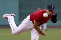 Boston Red Sox starting pitcher Nathan Eovaldi watches a throw to an Oakland Athletics batter during the first inning of a baseball game Tuesday, May 11, 2021, in Boston. (AP Photo/Mary Schwalm)