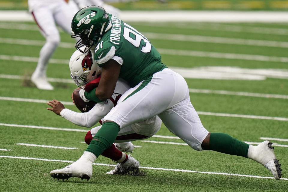 New York Jets defensive end John Franklin-Myers (91) sacks Arizona Cardinals quarterback Kyler Murray (1) during the second half of an NFL football game, Sunday, Oct. 11, 2020, in East Rutherford. (AP Photo/Seth Wenig)