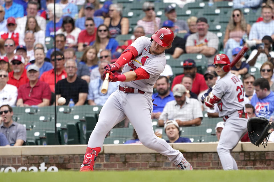 St. Louis Cardinals' Nolan Gorman hits an RBI single off Chicago Cubs starting pitcher Marcus Stroman, scoring Paul Goldschmidt, during the first inning of a baseball game Thursday, Aug. 25, 2022, in Chicago. (AP Photo/Charles Rex Arbogast)