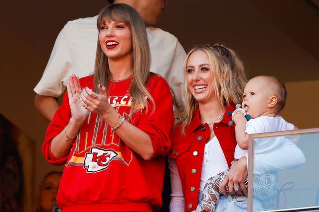 <p>David Eulitt/Getty </p> Taylor Swift and Brittany Mahomes attend the Los Angeles Chargers vs. Kansas City Chiefs Game in Kansas City.