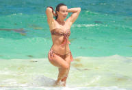 <p>Julianne Hough goes for a swim in Tulum, Mexico on Wednesday.</p>