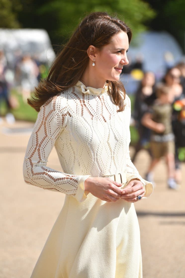 <i>The Duchess accessorised with pearl earrings [Photo: PA]</i>