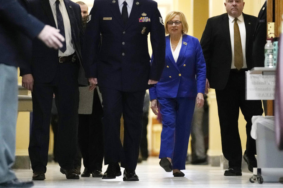 Democratic Gov. Janet Mills walks to the House Chamber prior to delivering her State of the State address, Tuesday, Jan. 30, 2024, at the State House in Augusta, Maine. (AP Photo/Robert F. Bukaty)