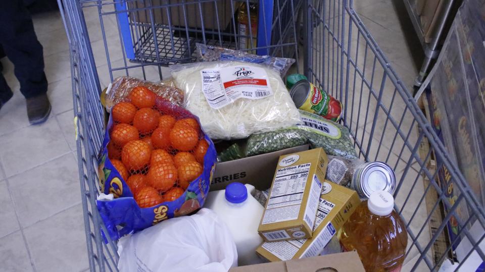 Residents receiving emergency food assistance in Hatch, New Mexico, get a variety of produce and food items, as seen in this basket prepped for distribution on April 3, 2024.