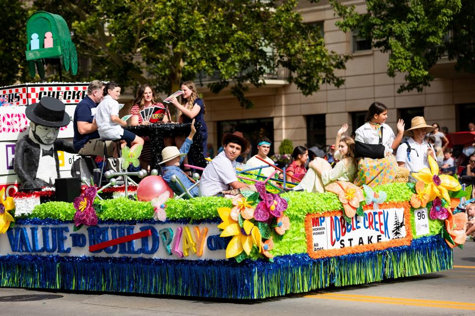 Parade participants from the Cobble Creek Stake sit on their float at the Days of ’47 Parade in Salt Lake City on Monday, July 24, 2023. | Megan Nielsen, Deseret News