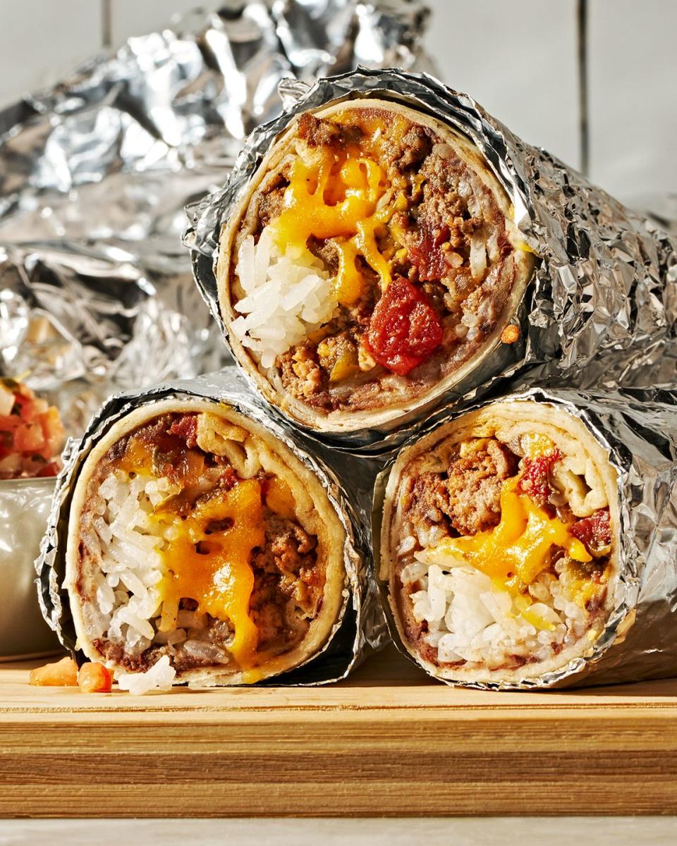 seasoned ground beef layered with refried beans, rice, and a blend of monterey jack and cheddar cheese then rolled into a flour tortilla