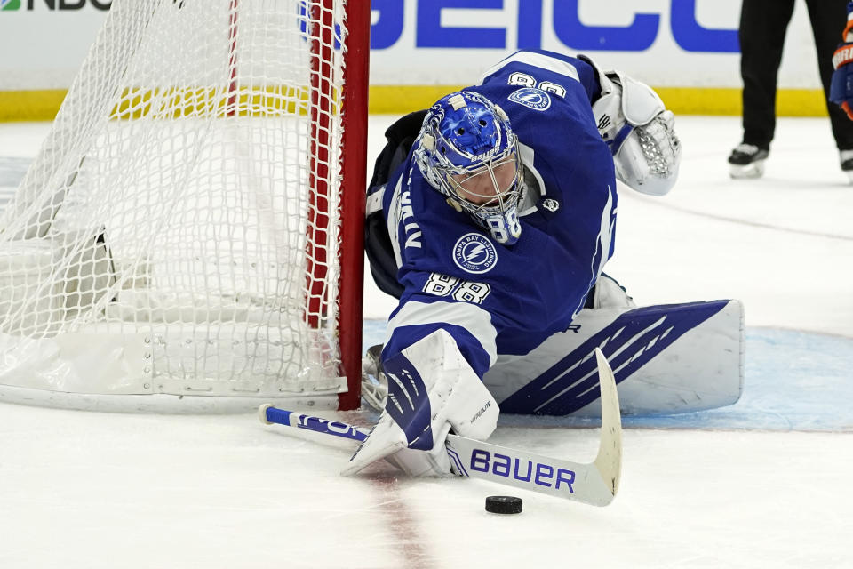 Tampa Bay Lightning goaltender Andrei Vasilevskiy makes a save on a shot by the New York Islanders during the third period in Game 7 of an NHL hockey Stanley Cup semifinal playoff series Friday, June 25, 2021, in Tampa, Fla. (AP Photo/Chris O'Meara)