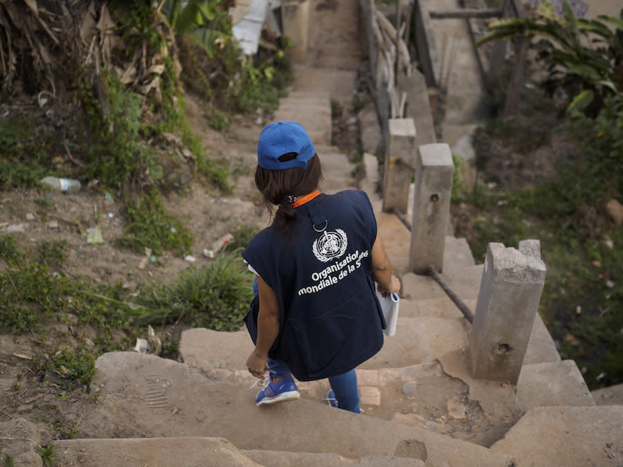 Harimahefa Razafimandimby, a Malagasy doctor helping to fight the plague epidemic, makes her way to a house visit. (Photo: Safidy Andrianantenaina)