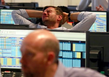 A trader from BGC, a global brokerage company in London's Canary Wharf financial centre reacts during trading June 24, 2016 after Britain voted to leave the European Union in the EU BREXIT referendum. REUTERS/Russell Boyce