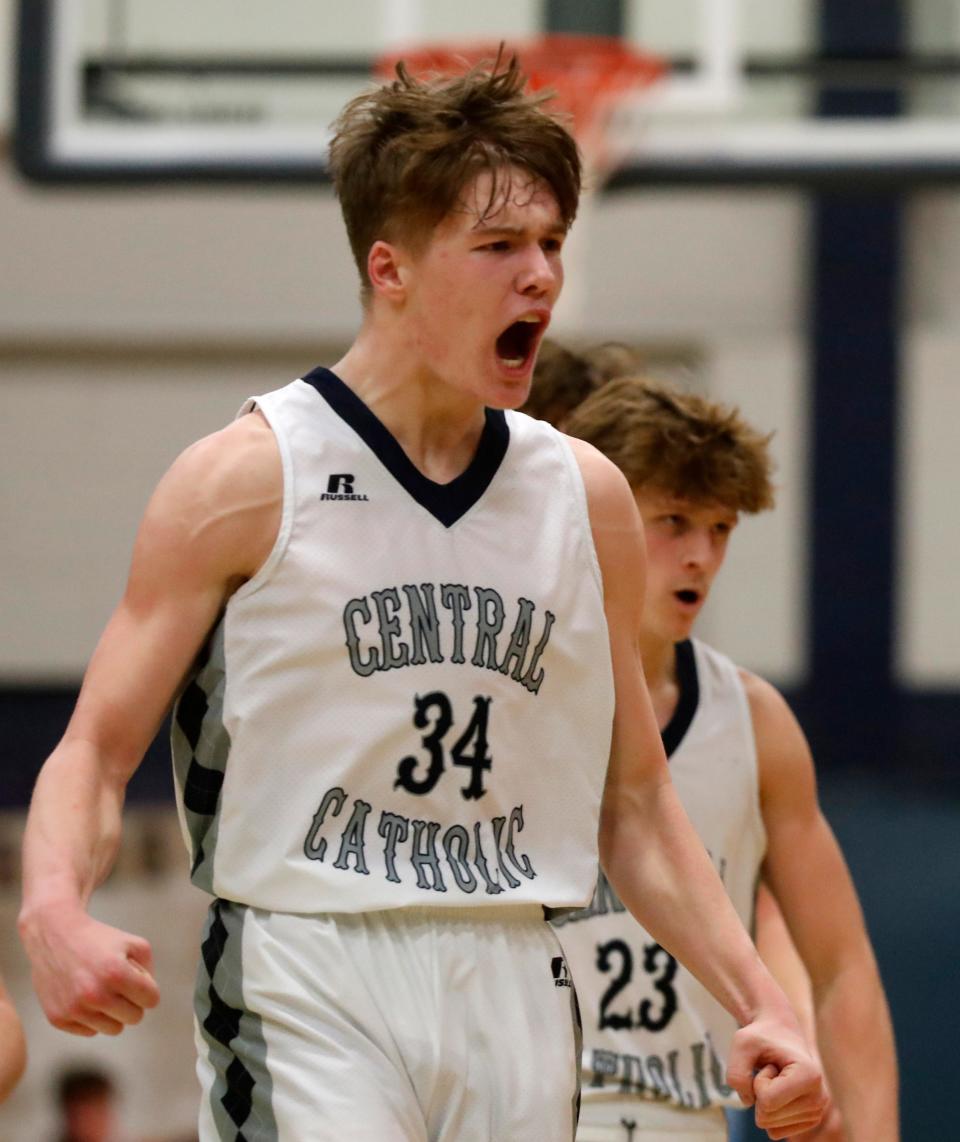 Central Catholic Albert Schwartz (34) reacts to making a shot during the IHSAA boy’s basketball game against the West Lafayette Red Devils, Friday, Feb. 10, 2023, at Central Catholic High School in Lafayette, Ind. West Lafayette won 54-49.