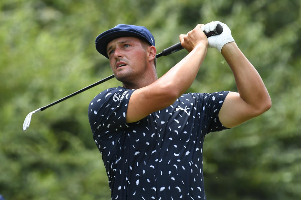 Bryson Dechambeau hits on the fourth hole during the final round in the World Golf Championship-FedEx St. Jude Invitational tournament, Sunday, Aug. 8, 2021, in Memphis, Tenn. (AP Photo/John Amis)