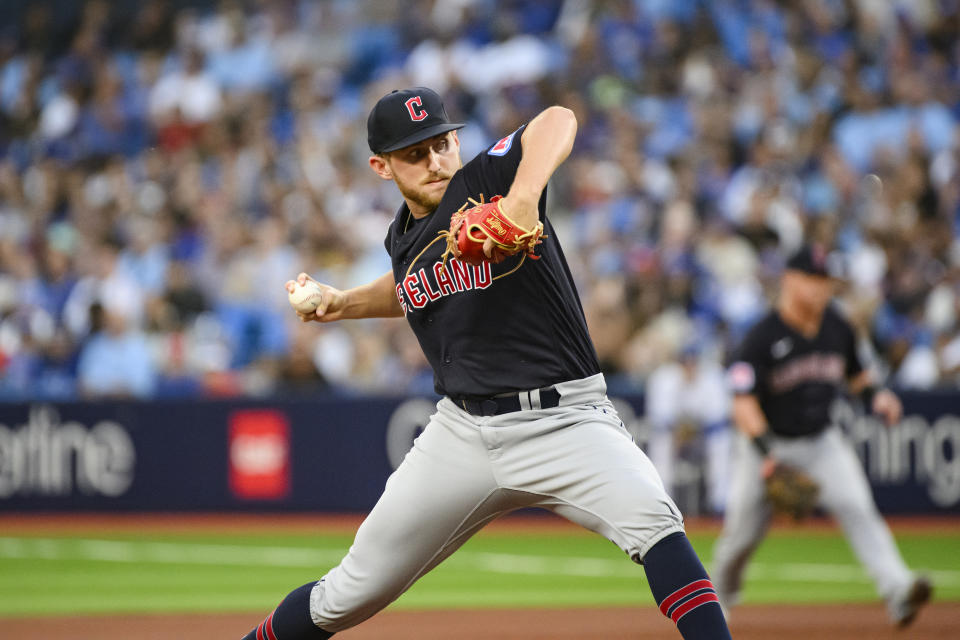 Cleveland Guardians starting pitcher Tanner Bibee works against the Toronto Blue Jays during the first inning of a baseball game Friday, Aug. 25, 2023, in Toronto. (Christopher Katsarov/The Canadian Press via AP)