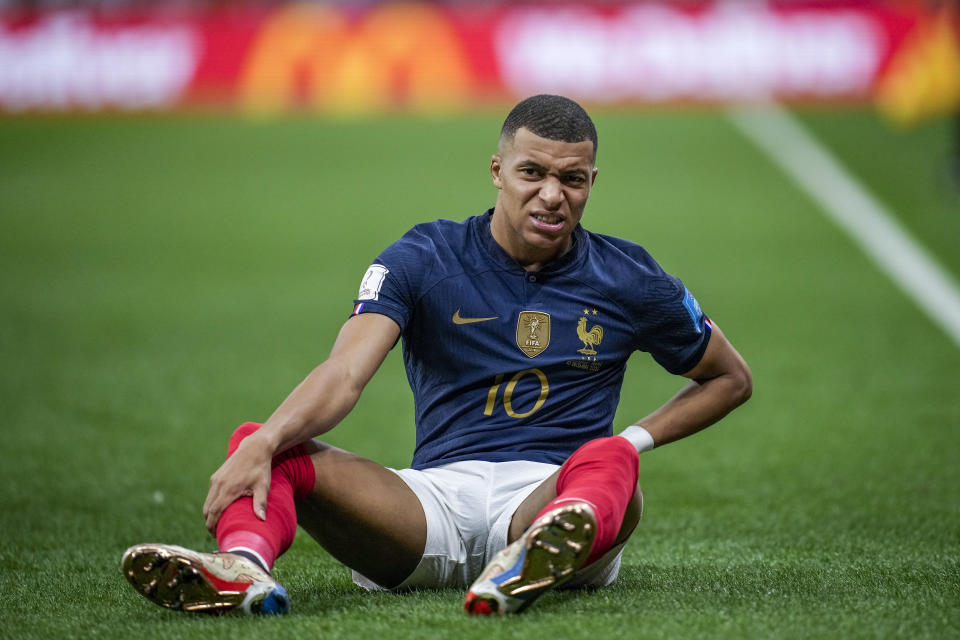 France's Kylian Mbappe reacts during the World Cup quarterfinal soccer match between England and France, at the Al Bayt Stadium in Al Khor, Qatar, Saturday, Dec. 10, 2022. (AP Photo/Christophe Ena)