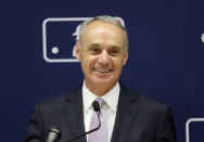 Major League Baseball commissioner Rob Manfred speaks to reporters after a meeting of baseball team owners in New York, Thursday, June 20, 2019. The Tampa Bay Rays have received permission from Major League Baseball's executive council to explore a plan that could see the team split its home games between the Tampa Bay area and Montreal, reports said Thursday. (AP Photo/Seth Wenig)