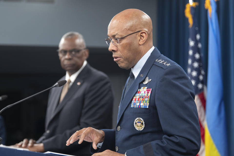 FILE - Chairman of the Joint Chiefs of Staff Gen. CQ Brown Jr., speaks during a press briefing with Defense Secretary Lloyd Austin, left, April 26, 2024 at the Pentagon in Washington. (AP Photo/Kevin Wolf)