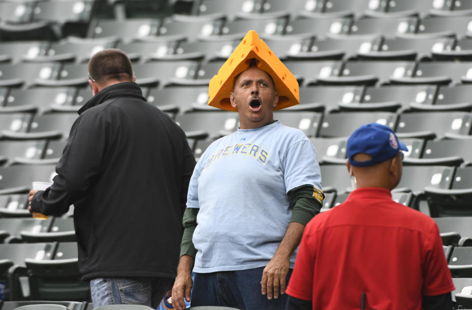 A Milwaukee Brewers fan yells in the stands before a baseball game against the Chicago Cubs on Monday, Oct. 1, 2018, in Chicago. Milwaukee visits Chicago on Monday for the first tiebreaker in major league history in which the loser doesn't go home. The winner advances to the Division Series, the loser to Tuesday's wild-card game against the loser of the NL West tiebreaker later Monday between Colorado and the Los Angeles Dodgers. (AP Photo/Matt Marton)