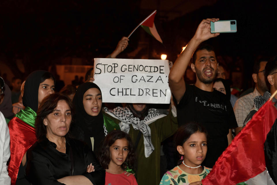 Hundreds of Moroccans take part in a protest in solidarity with Palestinians in Gaza, following the bombing of AlAhli hospital, in Rabat, Morocco, Tuesday, Oct. 17, 2023. (AP Photo)