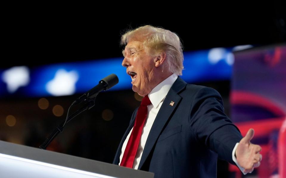 Former US President Donald Trump speaks during the Republican National Convention (RNC) at the Fiserv Forum in Milwaukee, Wisconsin, US, on Thursday, July 18, 2024. The RNC chairman warned against complacency when his party concludes its official nominating jamboree this week with polls predicting ex-President Donald Trump prevailing over President Joe Biden in the November election. Photographer: Al Drago/Bloomberg