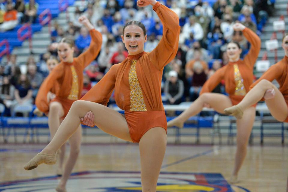 A Sartell dancer strikes a pose during its jazz routine at the Central Lakes Conference dance meet at Apollo High School on Friday, Dec. 3, 2021. 