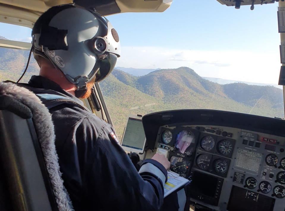 A helicopter pilot is pictured.