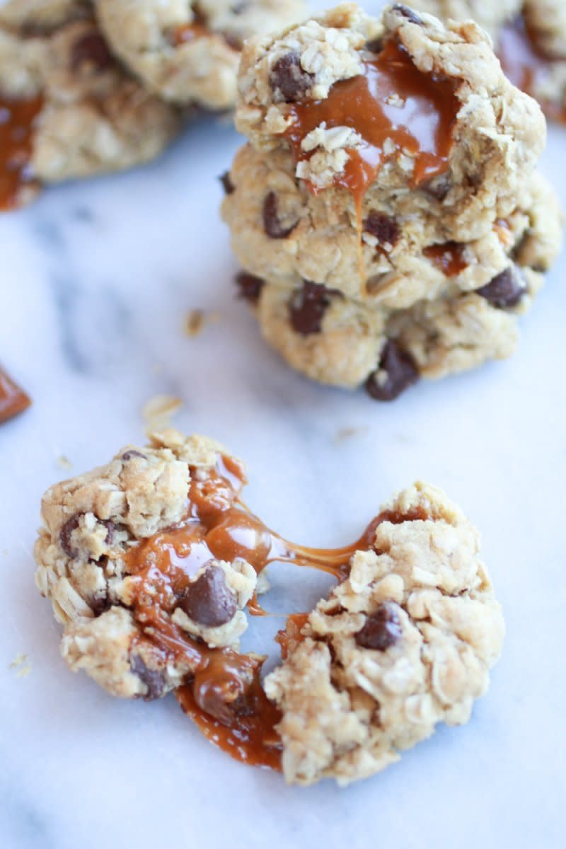 <strong>Get the <a href="http://www.halfbakedharvest.com/burnt-peanut-butter-caramel-oatmeal-chocolate-chip-cookies/" target="_blank">Burnt Peanut Butter Caramel Oatmeal Chocolate Chip Cookies recipe </a>from Handle The Heat</strong>