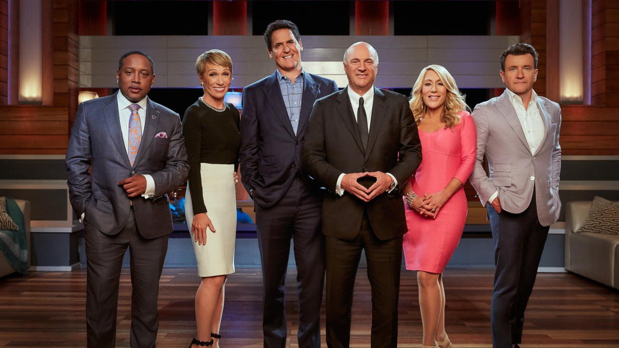 SHARK TANK Daymond John, Barbara Corcoran, Mark Cuban, Kevin O'Leary, Lori Greiner and Robert Herjavec are the 