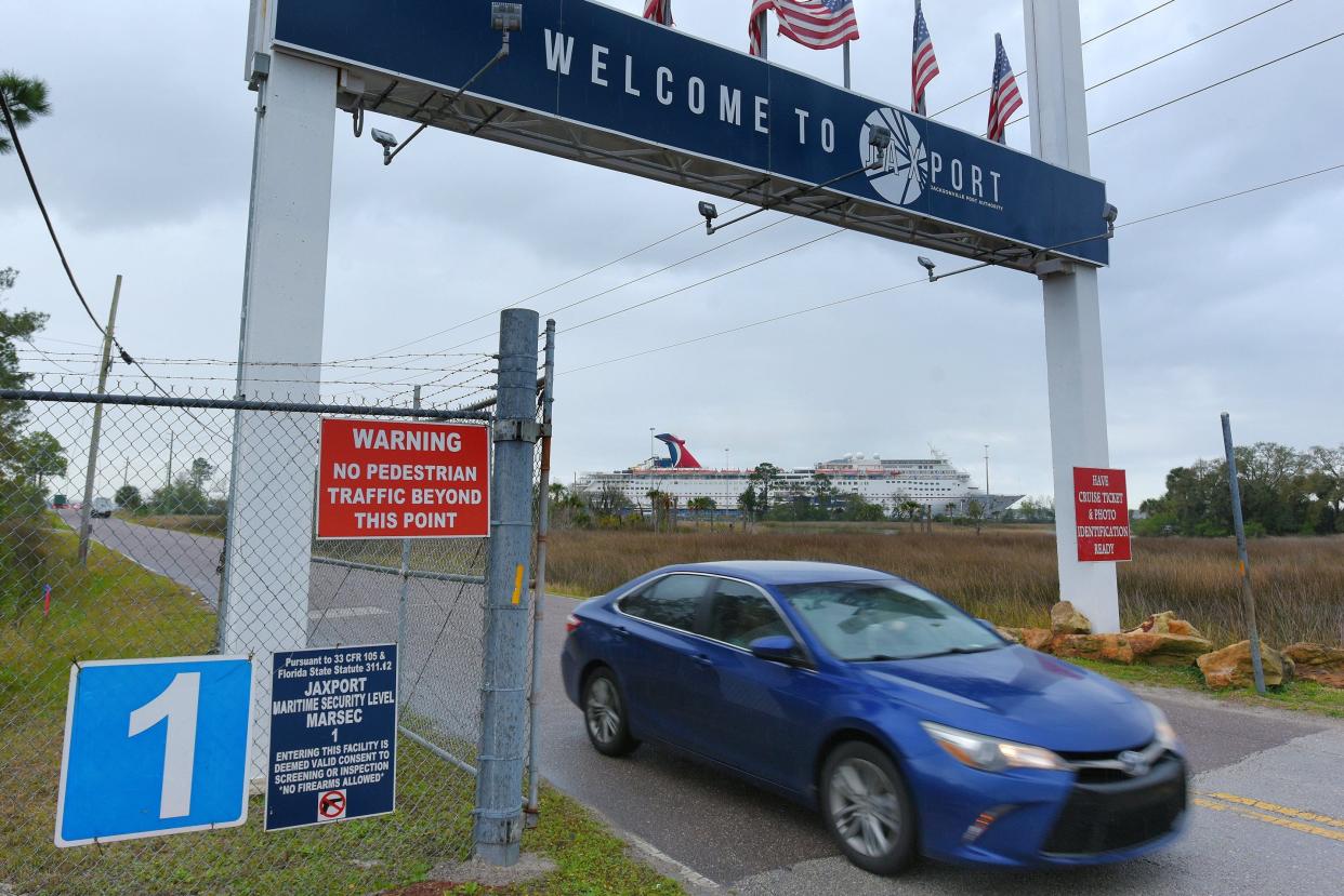 A driver leaves the JaxPort cruise terminal off Heckscher Drive in this file photo with a Carnival cruise ship in the background. JaxPort is working with another cruise line to bring a second service for cruises out of Jacksonville.