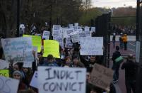 People march in protest against police violence in Boston, Massachusetts April 29, 2015. Protesters marched against police violence in cities from New York to Boston on Wednesday, as troops stood by in Baltimore to enforce a curfew imposed after civil unrest over the death of a 25-year-old black man. (REUTERS/Brian Snyder)