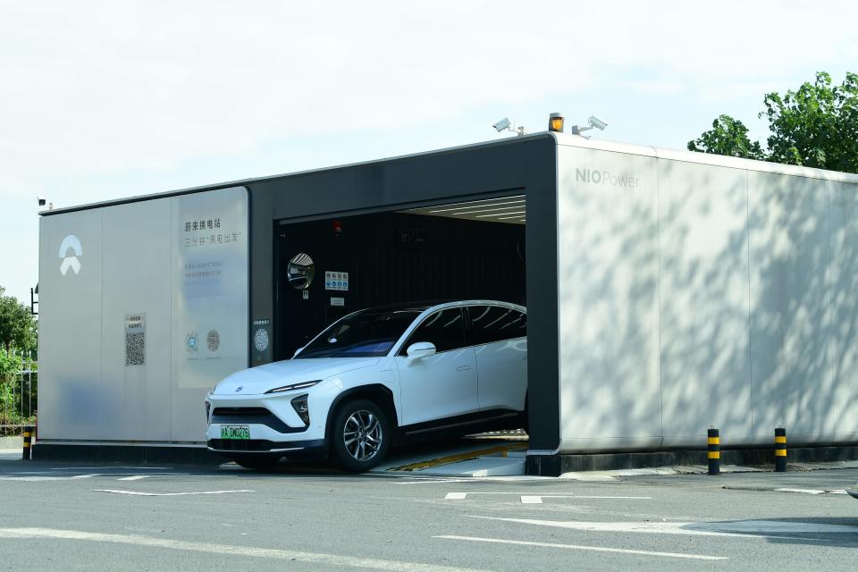 a Nio car in the Nio battery-swapping station