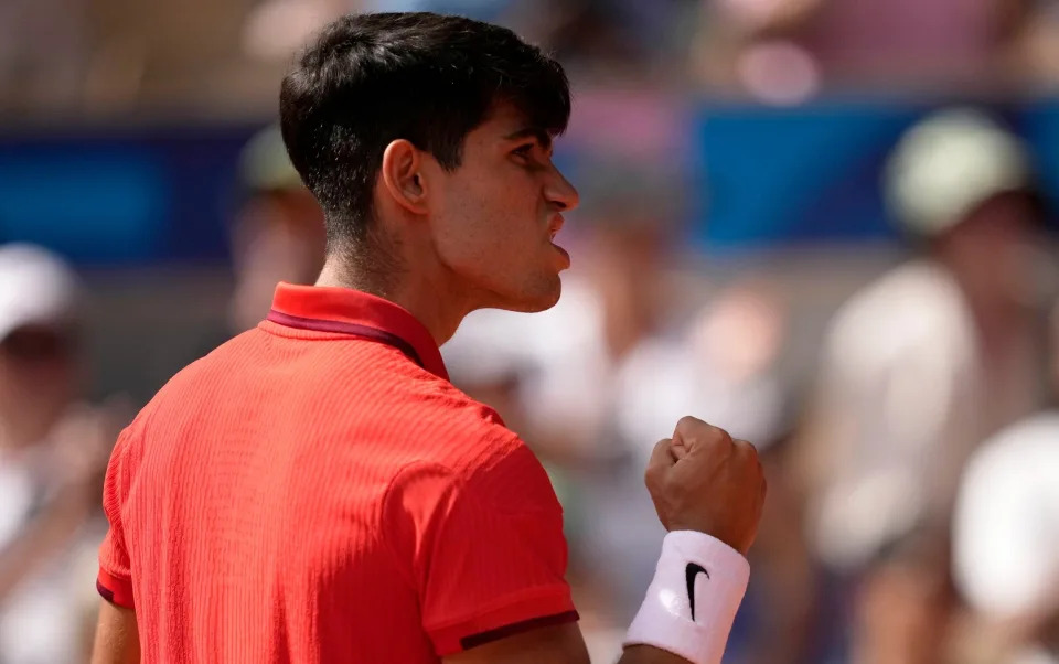 Alcaraz celebrates winning a game against Djokovic