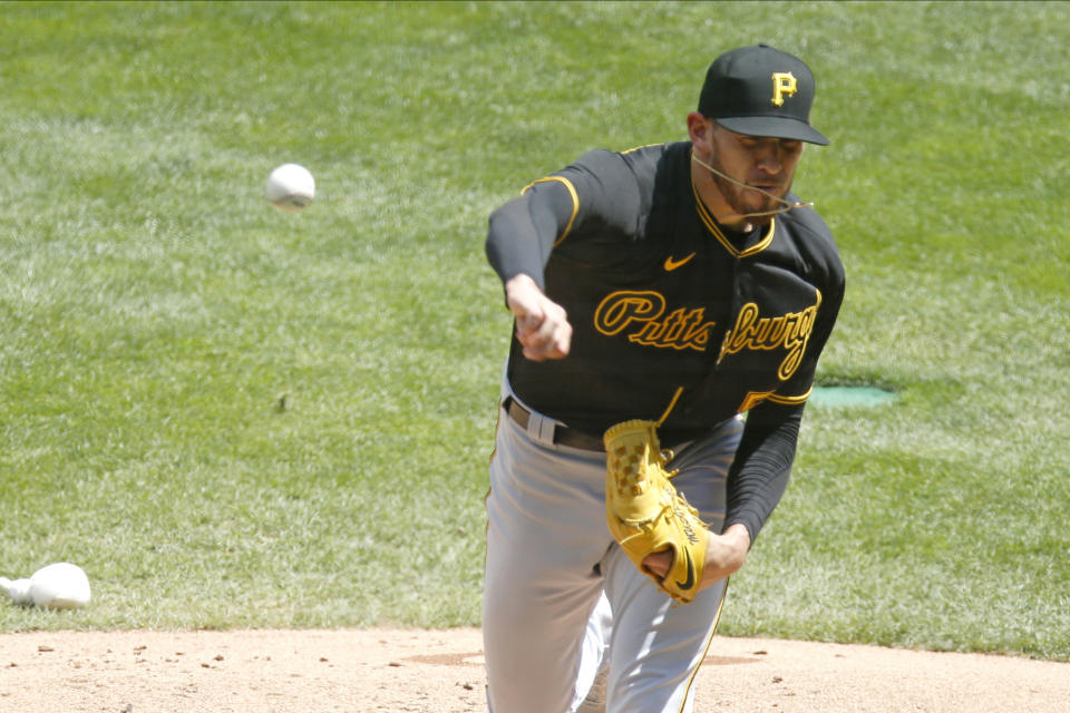 Pittsburgh Pirates pitcher Joe Musgrove throws against the Minnesota Twins in the first inning of a baseball game Tuesday, Aug. 4, 2020, in Minneapolis. (AP Photo/Jim Mone)