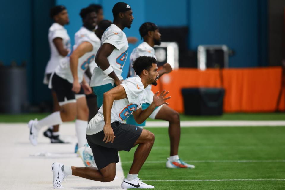 Jul 24, 2024; Miami Gardens, FL, USA; Miami Dolphins wide receiver Anthony Schwartz (84) works out during training camp at Baptist Health Training Complex. Mandatory Credit: Sam Navarro-USA TODAY Sports