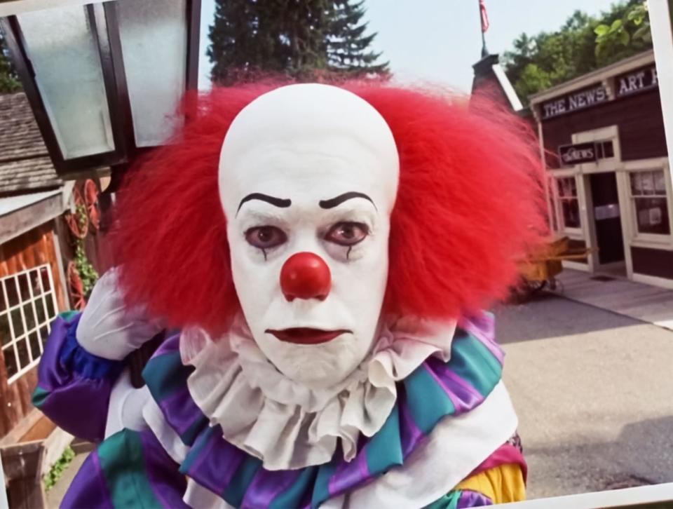 Tim Curry as Pennywise in a scene from the mini-series It