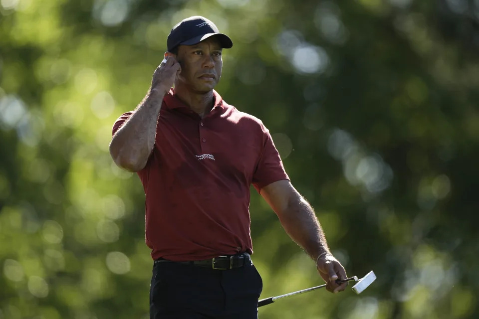 Tiger Woods walks to the green on the fifth hole during final round at the Masters golf tournament at Augusta National Golf Club Sunday, April 14, 2024, in Augusta, Ga. (AP Photo/Charlie Riedel)