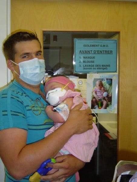 Mathieu Ferland pictured with their daughter Magalie. She was in and out of the hospital for most of her short life. 