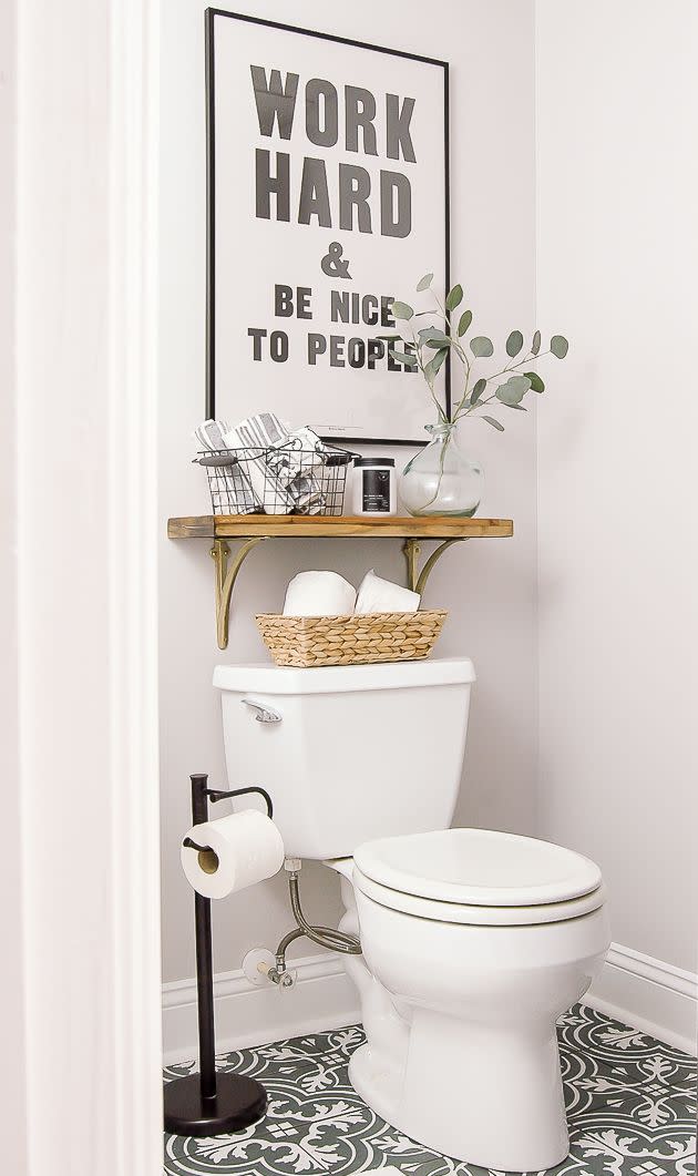 bathroom shelf ideas, one single wooden shelve above the toilet