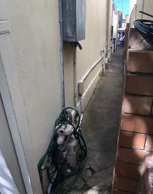 The alleyway where workers have been walking down to access the bathroom. Source: Supplied