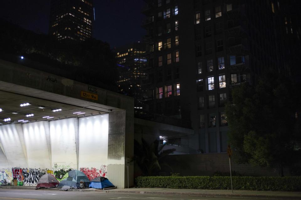A small homeless encampment is seen in a tunnel in downtown Los Angeles, Thursday, Sept. 14, 2023. (AP Photo/Jae C. Hong)