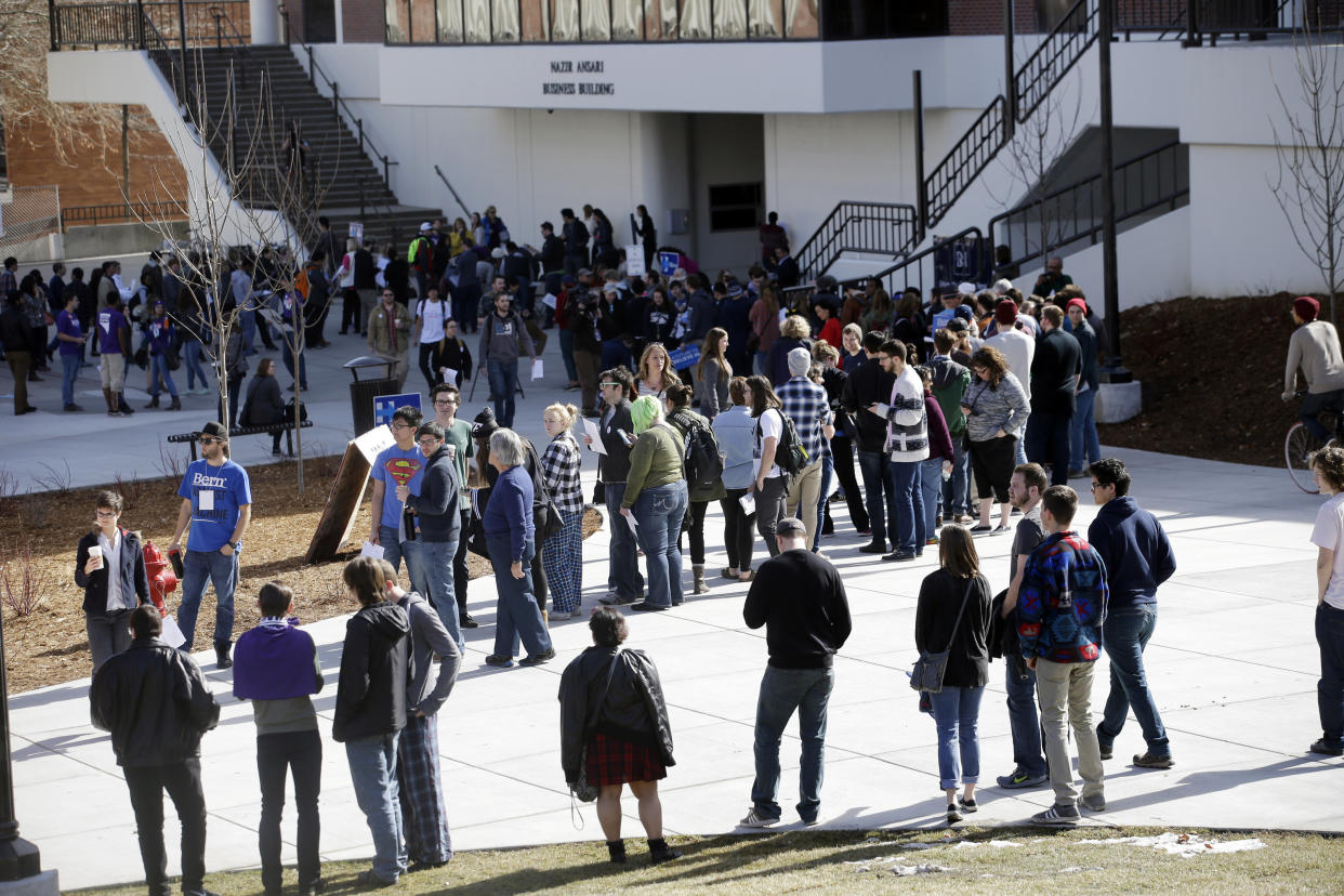 People line up to participate in the Democratic caucus at the University of Nevada in Reno. Nevada Democrats are proposing major changes to their presidential caucuses. (Photo: Marcio Jose Sanchez/ASSOCIATED PRESS)