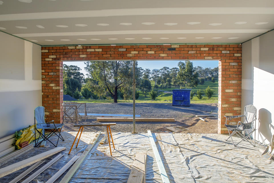 Residential home interior with insulation and plasterboard.