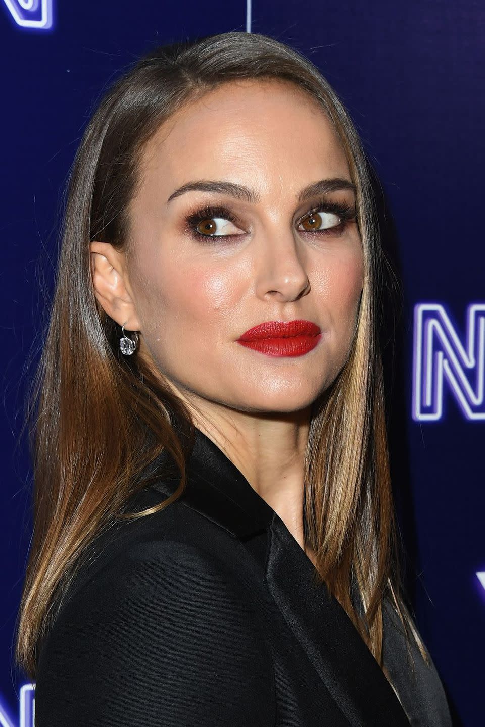 <p>To create Natalie Portman's burgundy smoky eyeshadow, the make-up artist Melanie Inglessis blended together the top and middle right-hand-side shades in Dior's <a rel="nofollow noopener" href="http://www.selfridges.com/GB/en/cat/dior-backstage-backstage-eye-palette-10g_359-84011246-C001200001/?" target="_blank" data-ylk="slk:Backstage Palette in Cool Neutrals;elm:context_link;itc:0;sec:content-canvas" class="link ">Backstage Palette in Cool Neutrals</a> and defined the actress' lashes with lots of mascara. The look was teamed with a traditional red lipstick, like Dior's classic <a rel="nofollow noopener" href="https://www.feelunique.com/p/DIOR-ROUGE-DIOR-Lipstick-3-5g?option=30317&gclid=Cj0KCQiAurjgBRCqARIsAD09sg_jTNC0MlGiO3iap4HXNPKXbN8dMhljRZ8RtF1ViPR1H0S9Mb9OQ0YaAmCEEALw_wcB&gclsrc=aw.ds" target="_blank" data-ylk="slk:Rouge Dior in 999;elm:context_link;itc:0;sec:content-canvas" class="link ">Rouge Dior in 999</a>.</p>