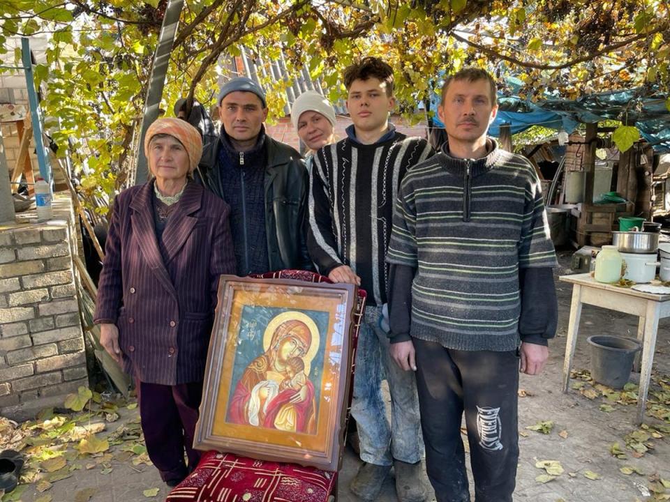 The Zdozovets family in October with the icon they commissioned (Kim Sengupta)